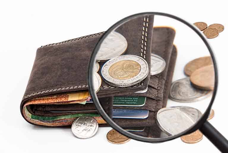 Photo of a wallet with coins